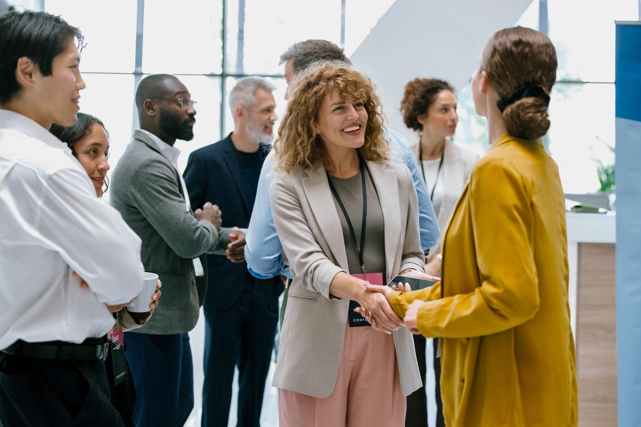 Supporters greeting each other at a campaign event
