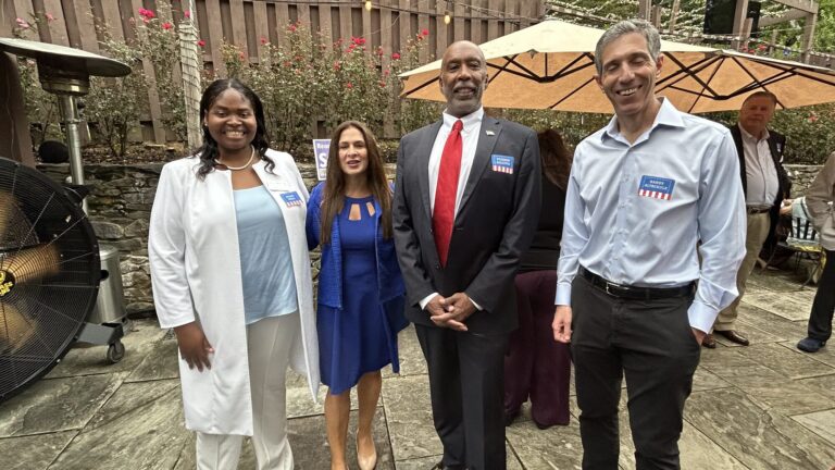 Esther Wells with supporters at a campaign reception
