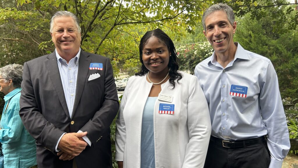 Esther Wells with two supporters at a campaign reception